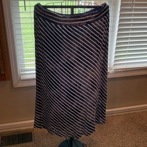 Long kinda tie dyed skirt.